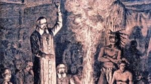 Pater Brébeuf versucht die Indianer zum christlichen Glauben zu missionieren
