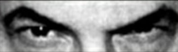 EIne Nahaufnahme der Augen von Aton Lavey, dem Gründer der 'Church of Satan'