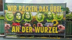 Plakat gegen die Grünen: Wir packen das Übel an der Wurzel